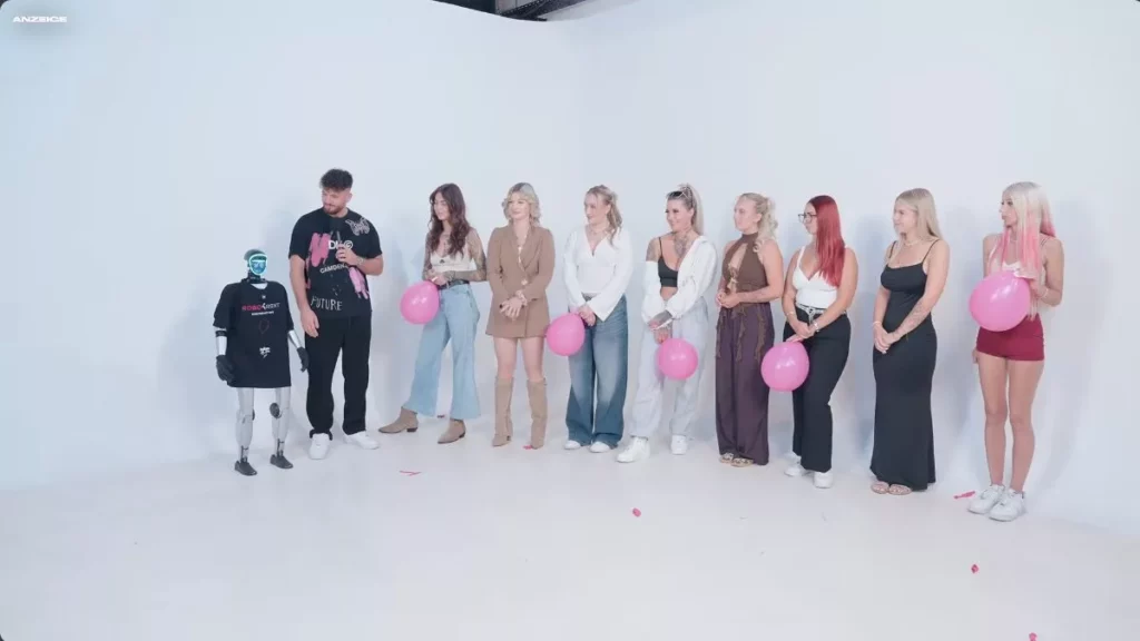 Robo4Rent robot with Momo Chahine and contestants holding pink balloons in Ballon Date episode 74.